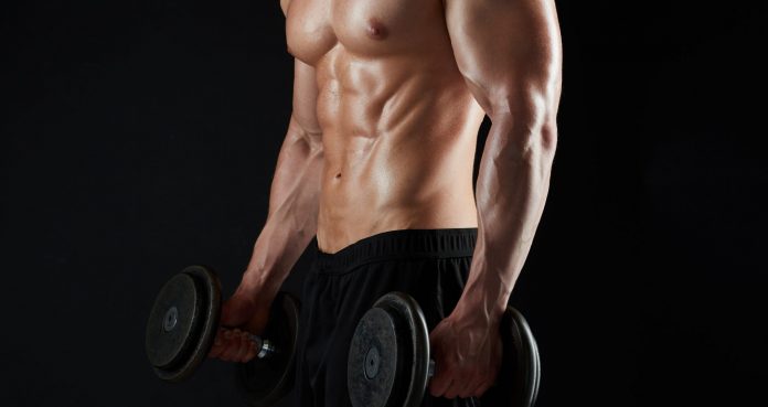 The Dumbbell Clean And Press: Everything You Need To Know