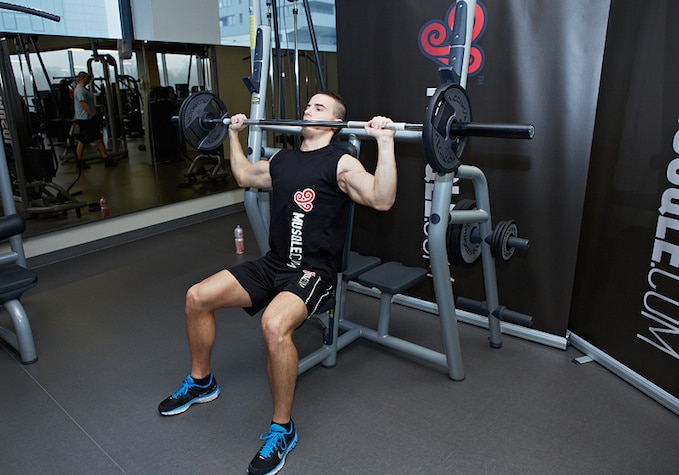 Build More Muscle With Seated Overhead Press