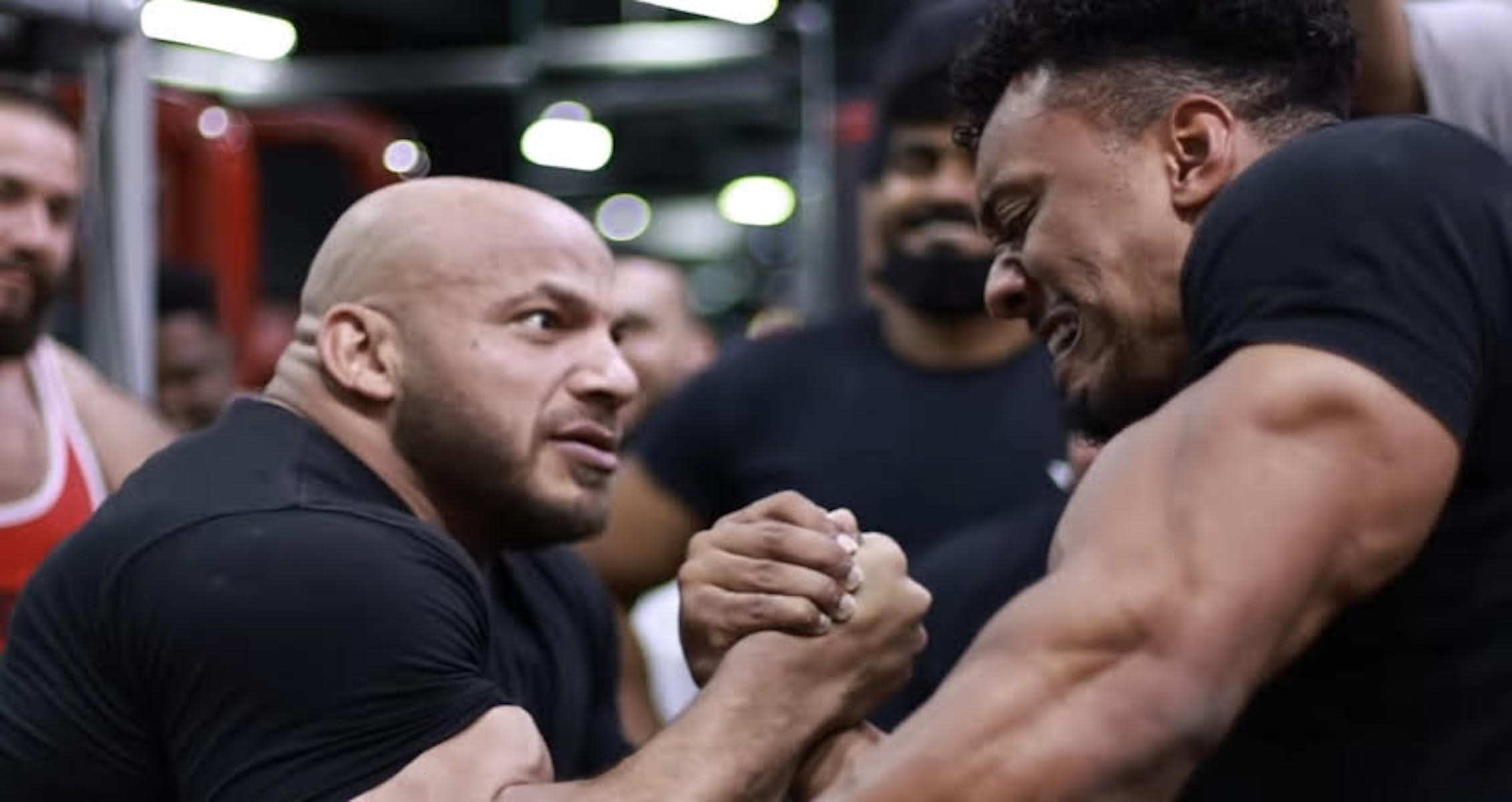 Big Ramy Takes On Larry Wheels In Arm Wrestling Match