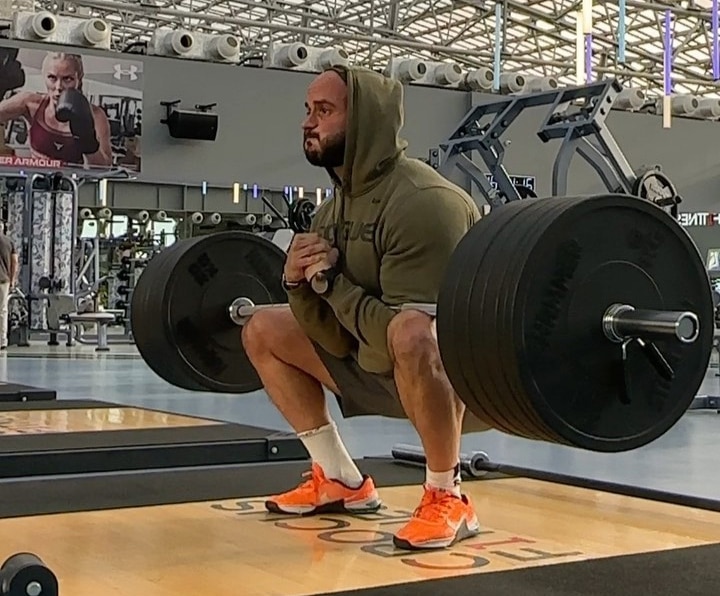 Fitness Trainer Doing Zercher Deadlift