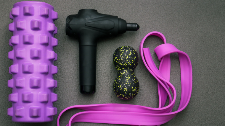 Massage Gun Vs. Foam Roller — Which Is Better for Strength Athletes?