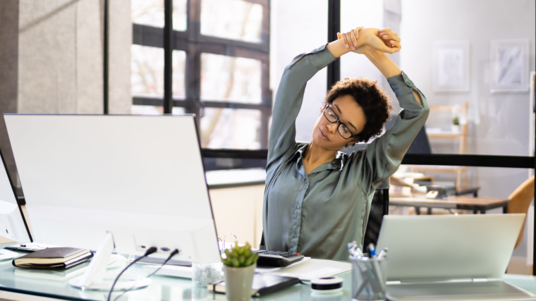 13 Best In-Chair Exercises to Do at Home (Or in the Office)