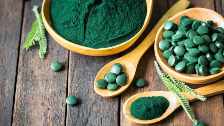 Spirulina powder and tablets.