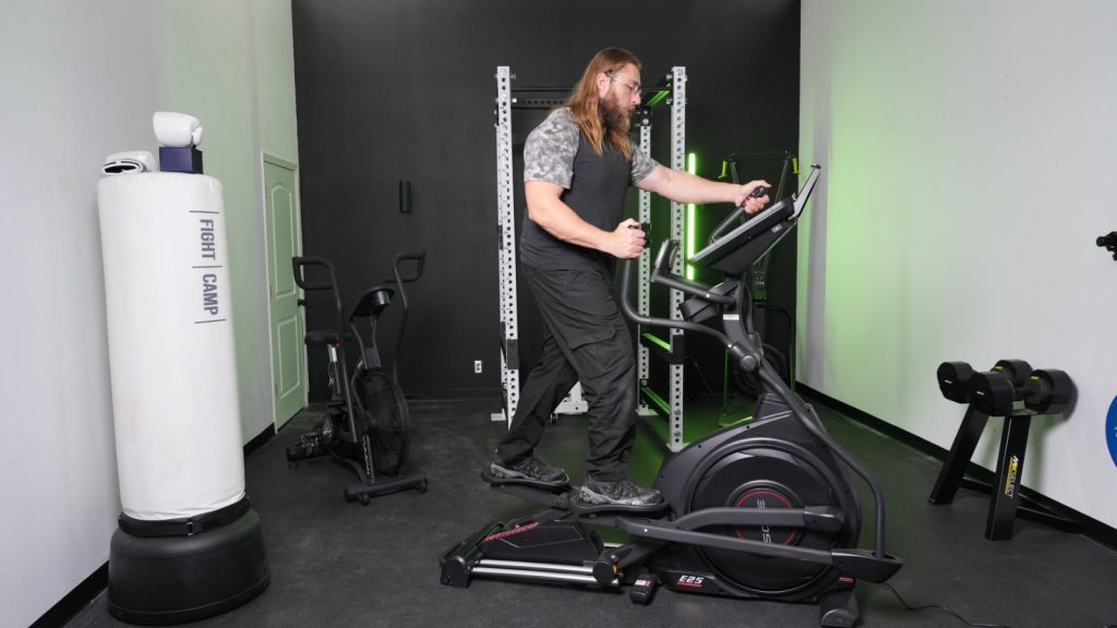 A person riding the Sole E25 Elliptical