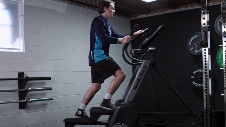 Jake on the elliptical in the Barbend gym.