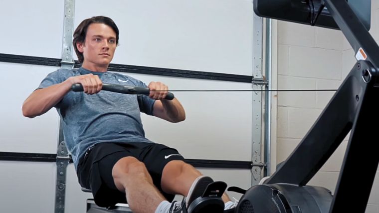 Jake working out on a rowing machine. 