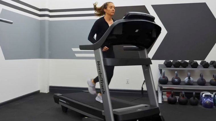 A person running on a treadmill.