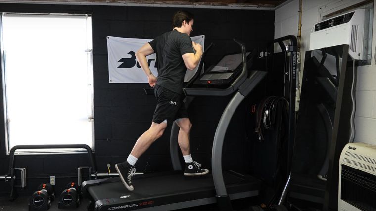 A person running on a treadmill.