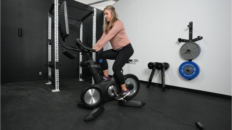 Our BarBend tester riding the Echelon Connect EX-8s.