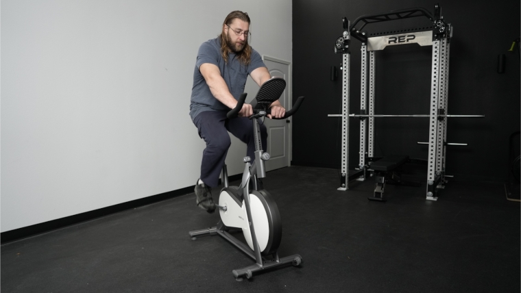 Our tester riding the Mobifitness Turbo Exercise Bike.