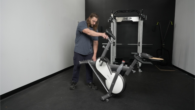 Our tester moving the Mobi Fitness Turbo Exercise Bike